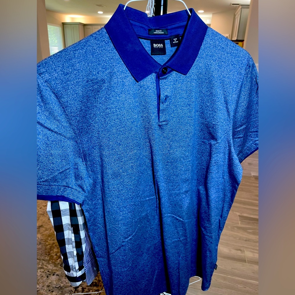 Boss polos size L. In great condition barely worn.